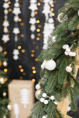 Christmas tree background. New Year composition with spruce, balls and lights