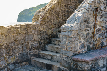 A stone staircase with fences inside an ancient fortress.