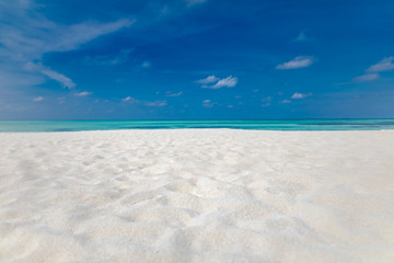 Fototapeta na wymiar Empty tropical beach background. Horizon with sky and white sand with copy space