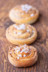 closeup of swedish kanelbullar with sugar