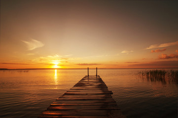 Beautiful sunset on lake in summer. Peace and relaxation in nature. Nobody