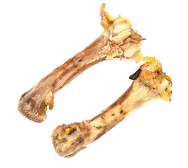 Small bones on a white background. food scraps. chicken bones