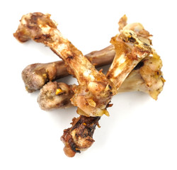Small bones on a white background. food scraps. chicken bones