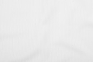 Obraz premium White fabric texture background with soft waves.