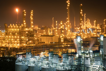 Factory of power and energy industrial at night. Petrochemical plant at twilight.
