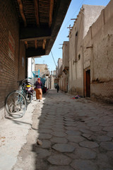 Narrow traditional authentic street of the old town. Kashgar, Xinjiang, China, Asia.