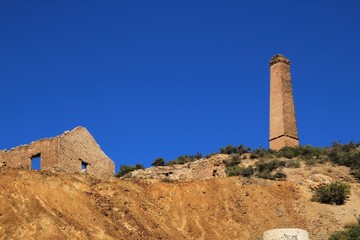 Sediments, rock formations and mineral streaks in an old abandoned quarry
