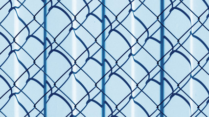 Fototapeta premium Metal fence horizontal industrial abstract background in shades of blue