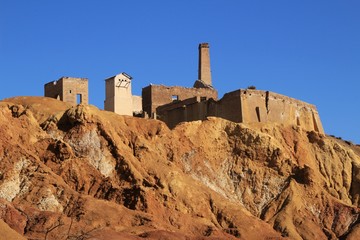 Sediments, rock formations and mineral streaks in an old abandoned quarry