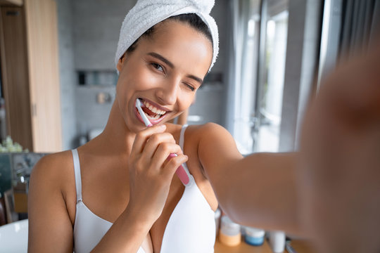 High-spirited lady with a towel on her head