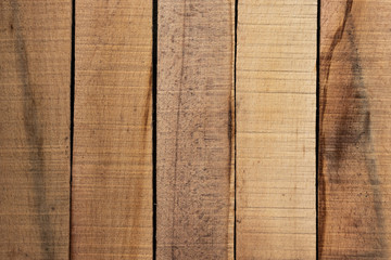 Background in the form of five vertical boards of light brown color, close-up