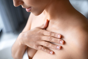 Calm Caucasian young lady wearing a brassiere