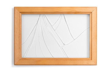 Wooden frame with broken glass on a white background
