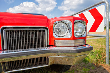 Classic luxury vintage car in the landscape