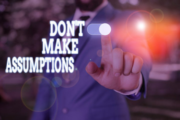 Text sign showing Don T Make Assumptions. Business photo text putting plan in future with percentage happening Male human wear formal work suit presenting presentation using smart device