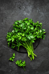 Obraz na płótnie Canvas Fresh parsley bunch, top view