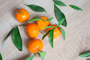 Tangerines food background. Healthy food. Vegetarian food. Vegetable food. Food tangerines with green leaves. Copyspace