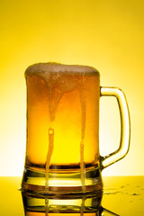 glass of beer with foam