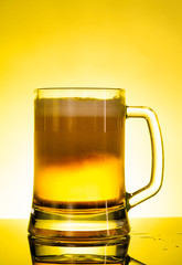 glass of beer with foam
