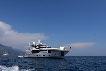 Fototapeta na wymiar Superyacht on the Mediterranean Amalfi Coast Positano Italy