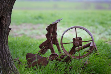 Old part of a machine that once helped accomplish tasks on a cattle ranch