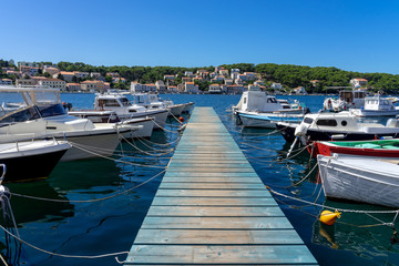 pier dock with boats in mali losinj island port croatia