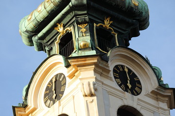 View of the Stiftskirsche tower with the clock