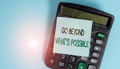 Text sign showing Go Beyond What S Possible. Business photo showcasing do bigger things You can reach dreams Portable electronic calculator device blank sticky note colored background