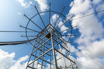 Antennas of military radio station are on the roof and blue sky as a background.
