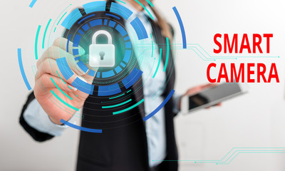 Writing note showing Smart Camera. Business concept for individual image processing systems designed to automate Female human wear formal work suit presenting smart device