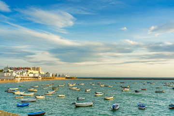 Fototapeta na wymiar fishing boats on La Caleta beach in Cadiz, Spain, Andalusia