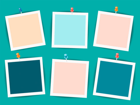 Empty photo frames on a dark turquoise background