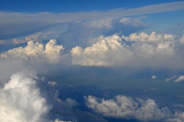 Clouds in the sky shot from an airplane.