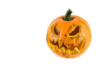 Large orange pumpkin with isolated eyes and mouth on a white background.