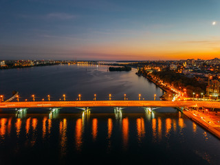Fototapeta na wymiar Night summer Voronezh, Chernavsky bridge and Massalitinov embankment, aerial view