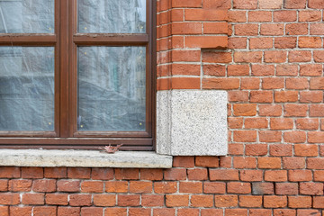  Old brick wall with window detail and stone window sill