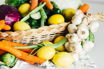 raw vegetables for Turkish homemade pickles. Vegetables are carrot, onion, cabbage, cucumber, onion, garlic, lemon, russian cucumber and green bean