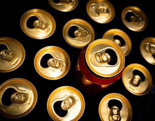 Abstract pattern of opened aluminium cans, top view. Excess drinking, consumerism, alcoholism, or be different concept