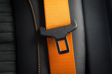 Part of orange  leather car seat details