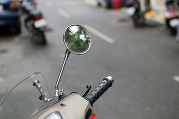 Naklejka premium Side View mirror and handle of motorcycle