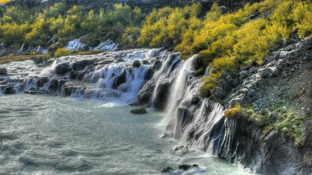 HD video of beautiful turquoise waterfalls in Iceland. HDR, HD video
