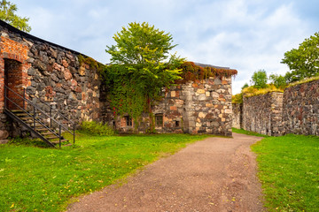 Fototapeta na wymiar Helsinki. Finland. Stone walls of the fortress of Sveaborg. The Fortress Of Suomenlinna. Travelling to Helsinki. An ancient fortress in Scandinavia. Sightseeing In Helsinki.