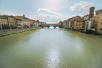 Obraz premium Ponte Vecchio in Florence, Italy. Ancient Bridge over the Arno River in one of Tuscany's biggest Tourist Attractions