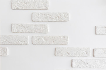 white wall with decorative brick elements