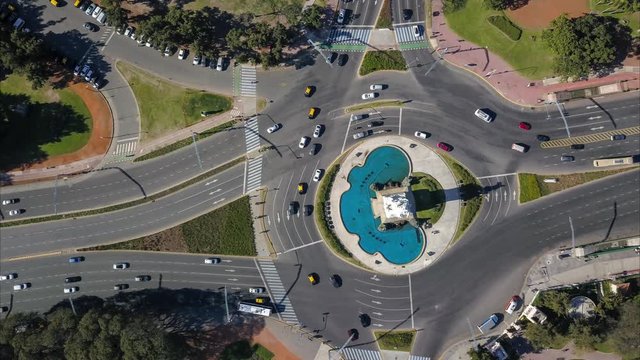 Aerial timelapse of traffic driving on a roundabout in Buenos Aires, Argentina