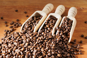 Roasted coffee beans in scoop