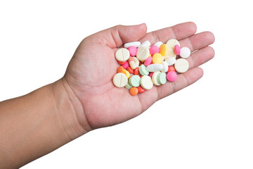 pills in hand isolated on white background