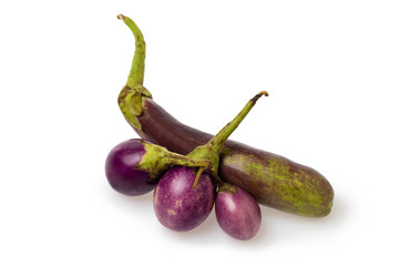 Closeup image of purple small thailand egglants group isolated at white background. Healthy vegan vegetable diet concept.