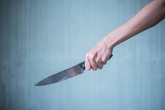 long knife in women hand