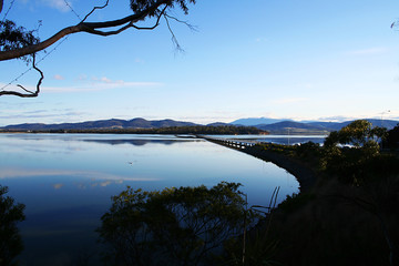 Refections in the dusk at Midway Point. Tasmania.